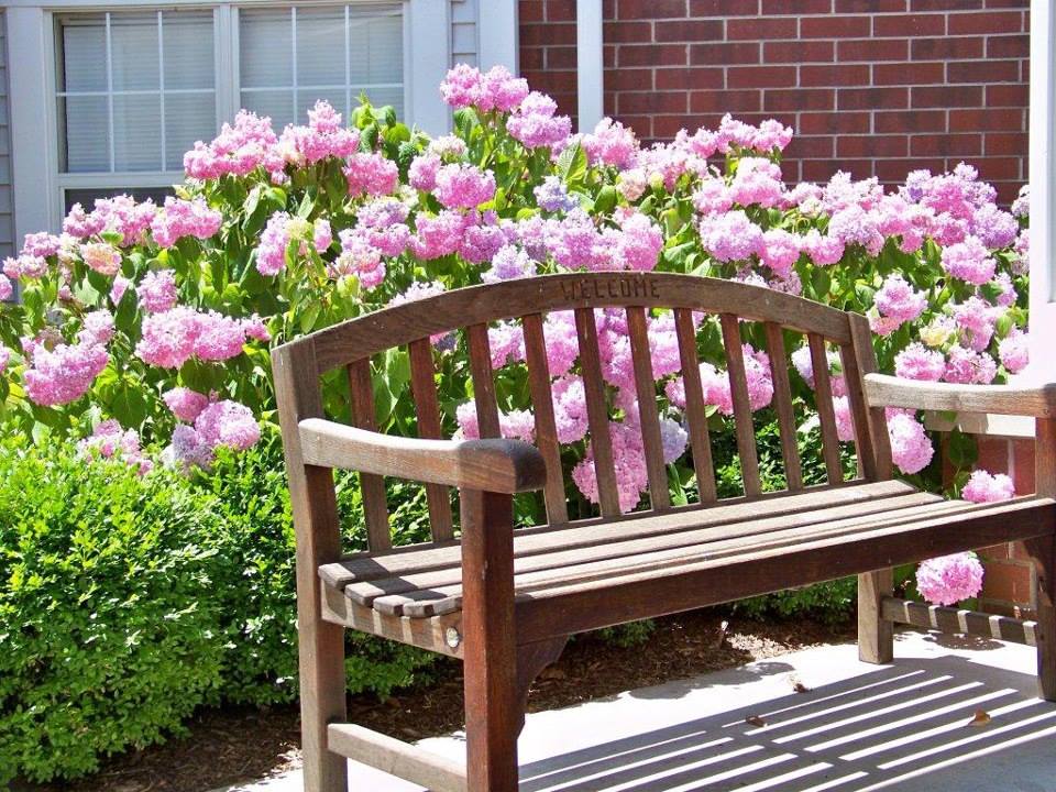 United Church Homes Welcome Bench with Flowers